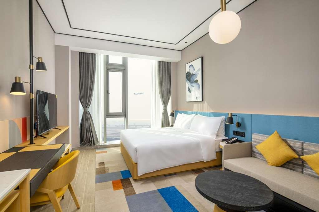 Hilton Garden Inn Shenzhen Airport,Enjoy 24-Hour One Way Free Delivery From Hotel To Shenzhen Baoan Airport On The Hour Šen-čen Pokoj fotografie